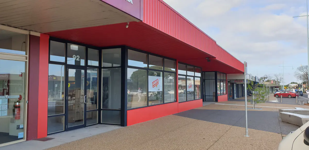 Red-painted commercial shopfront exterior