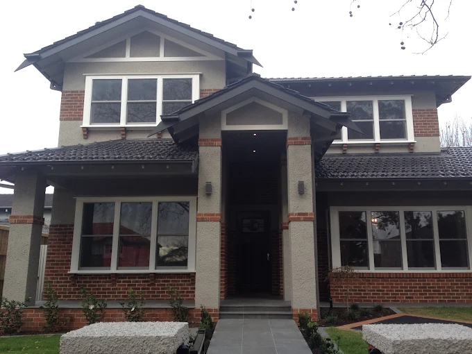 Two-storey home with painted exterior walls and trim