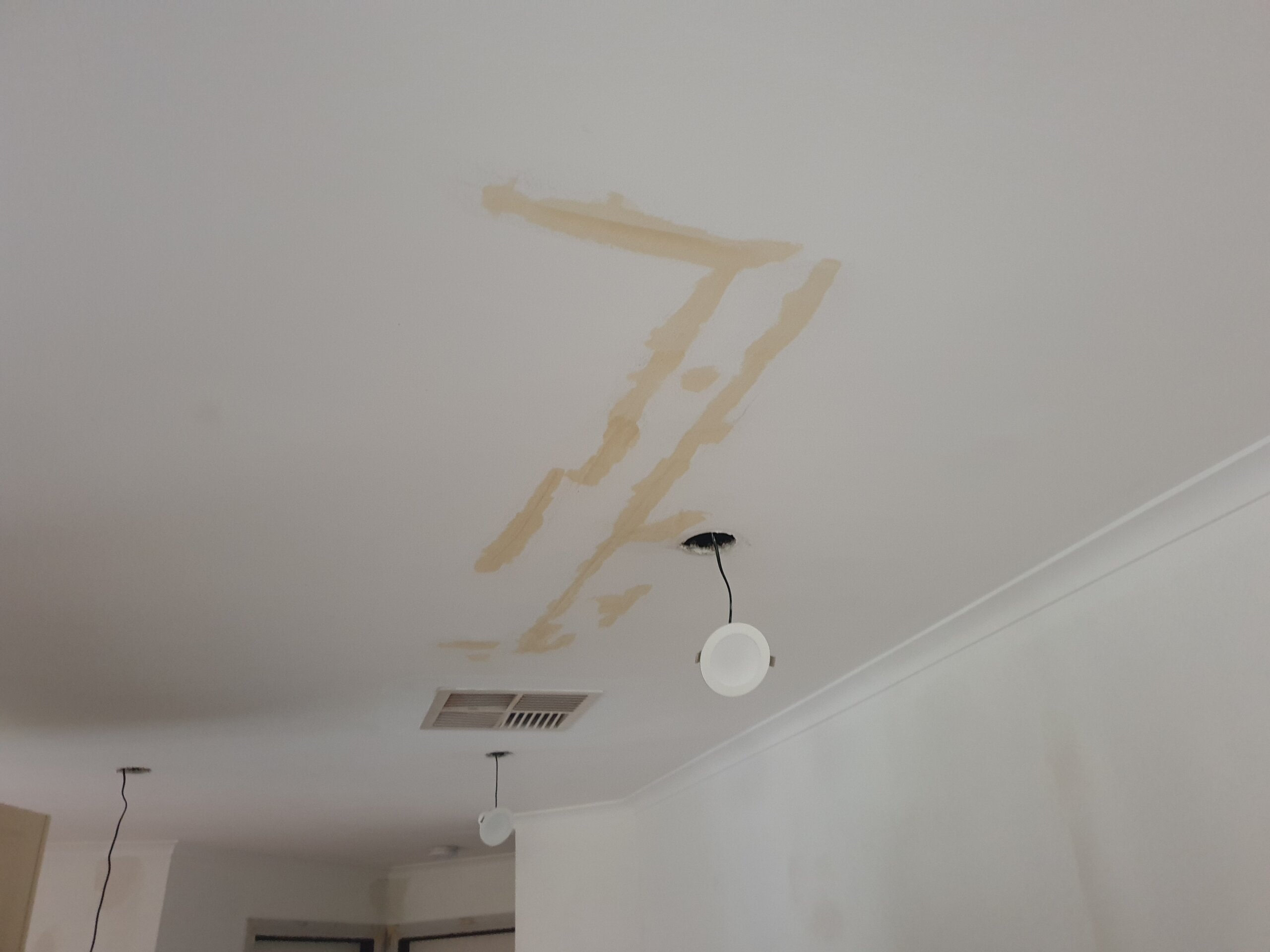 Ceiling patching and surface preparation before painting