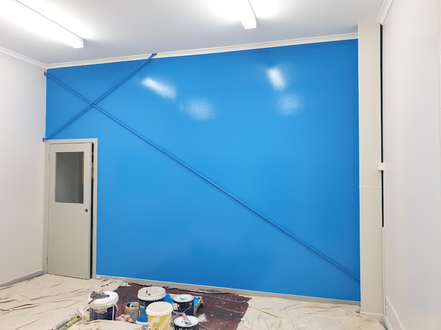Commercial interior wall painted blue