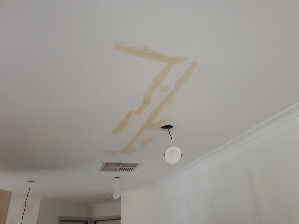 Ceiling patching and surface preparation before painting